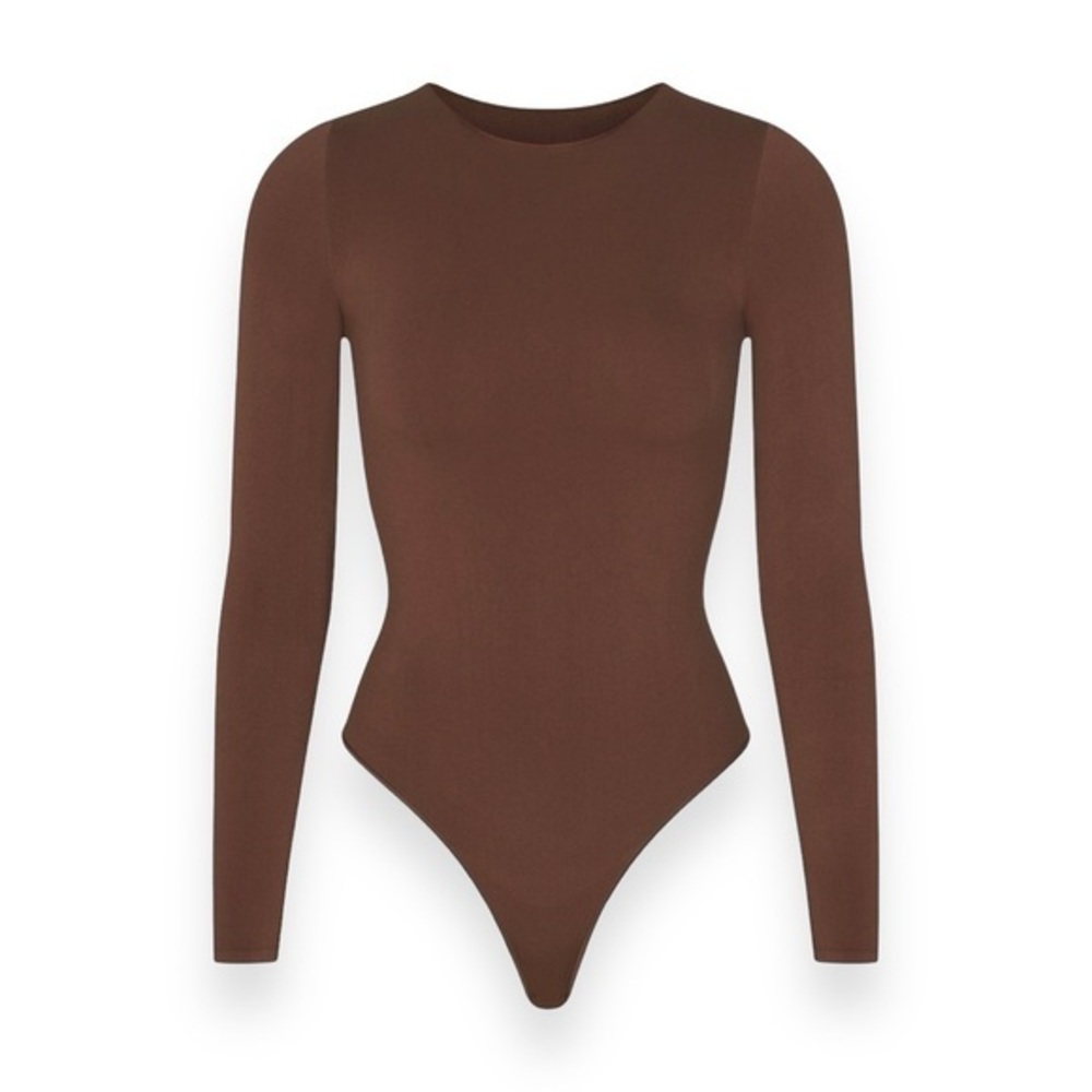 SKIMS Essential Crew Neck Long Sleeve Bodysuit in Cocoa
